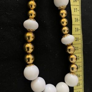 Elegant Gold and White Beaded Necklace